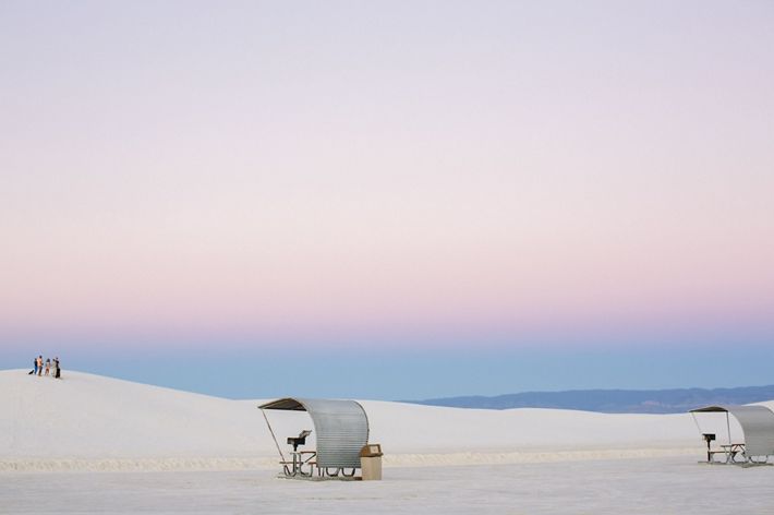 Picnic shelters at dusk at White Sands National Park, New Mexico.
