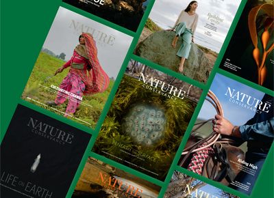 Several Nature Conservancy magazines laid out in rows.